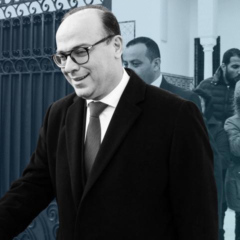 Tunisia's prime minister-designate Elyes Fakhfakh (front), tasked with forming a government, leaves his office in the capital Tunis on January 21, 2019. (Photo by FETHI BELAID / AFP) (Photo by FETHI BELAID/AFP via Getty Images)