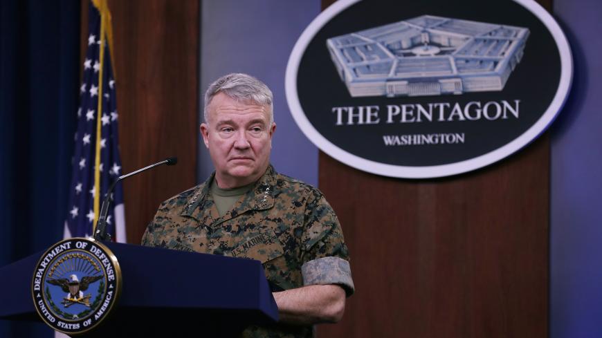 ARLINGTON, VIRGINIA - MARCH 13: Marine Corps Gen. Kenneth F. McKenzie, commander of U.S. Central Command, talks to journalists about the military response to rocket attacks that killed two U.S. and one U.K. service members in Iraq during a news briefing at the Pentagon March 13, 2020 in Arlington, Virginia. Because of the threat of transmission of the novel coronavirus (COVID-19), the Pentagon is exercising social distancing by keeping reporters' chairs four feet apart from each other during briefings. (Pho