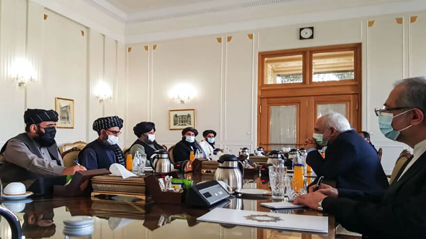 A picture obtained by AFP from the Iranian news agency Tasnim on January 31, 2021, shows Iran's Foreign Minister Mohammad Javad Zarif (2nd-R) meeting with Mullah Abdul Ghani Baradar (2nd-L) of the Taliban in Tehran.