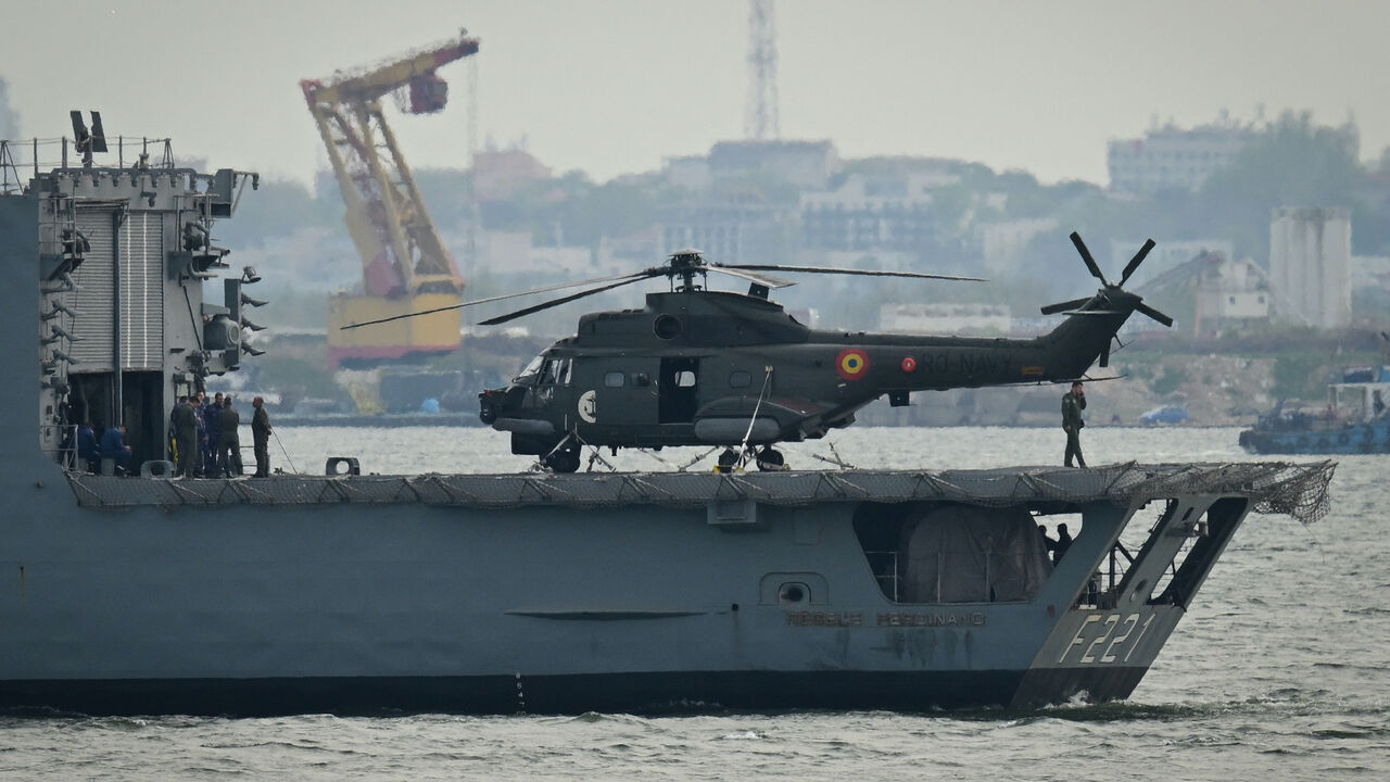 A Romanian Navy helicopter is pictured on the "King Ferdinand" frigate during "Sea Shield 24" exercise April 16, 2024.
