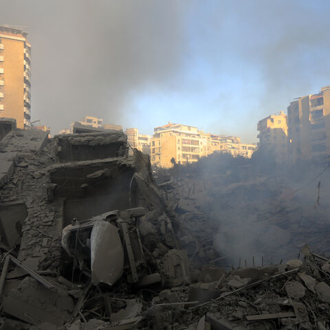 Smoke rises from buildings hit in an overnight Israeli airstrike that targeted the neighbourhood of Al-Jamous in Beirut's southern suburbs on October 3, 2024. Israel kept up its bombardment of Beirut after Iran launched its second, and largest, attack on Israel in months, which prompted Prime Minister Benjamin Netanyahu to warn Tehran would pay. (Photo by AFP) (Photo by -/AFP via Getty Images)