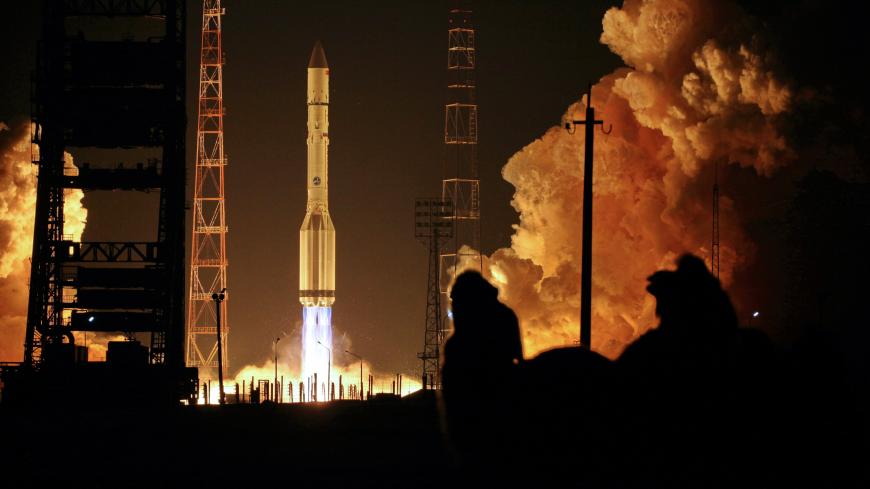Russian-built Proton-M rocket with the Turksat-4A Turkish communications satellite blasts off at the Russian leased Kazakhstan's Baikonur cosmodrome on February 15, 2014.  AFP PHOTO/STRINGER        (Photo credit should read STRINGER/AFP via Getty Images)