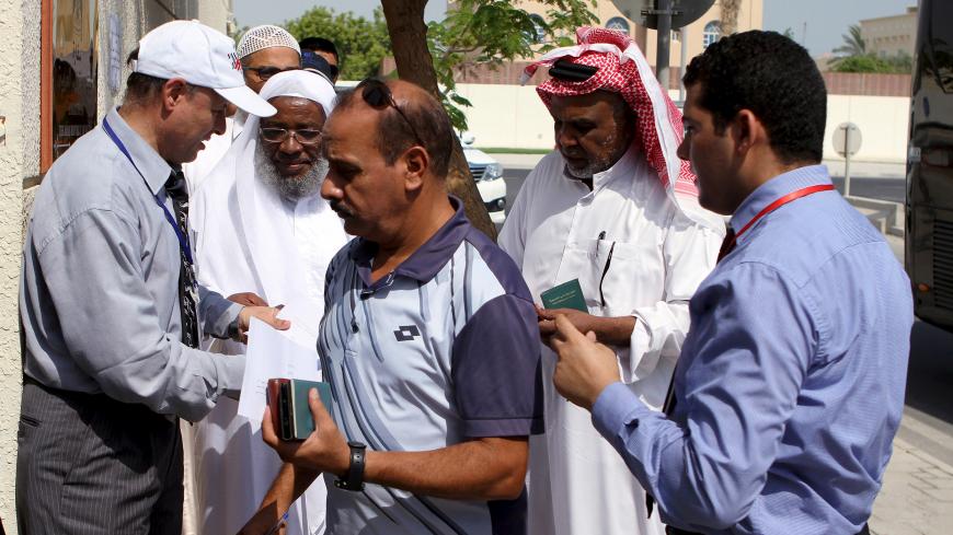 Egyptians living abroad arrive to cast their votes during the first stage of Egypt's parliamentary election at the Egyptian embassy in Doha, Qatar, October 17, 2015. REUTERS/Naseem Zeitoon - GF10000248038