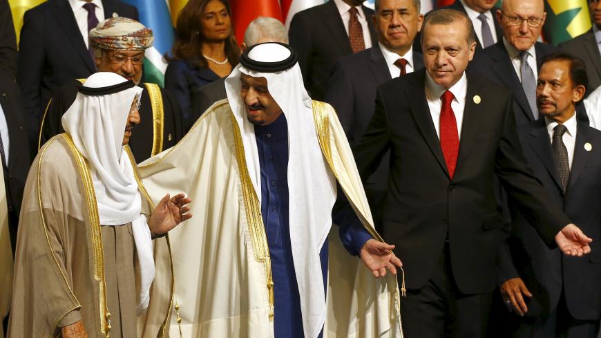 Turkish President Tayyip Erdogan (R), Emir of Kuwait Sheikh Sabah al-Ahmad al-Sabah (L) and King Salman of Saudi Arabia are pictured at a family photo session during the Organisation of Islamic Cooperation (OIC) Istanbul Summit in Istanbul, Turkey April 14, 2016. REUTERS/Murad Sezer - GF10000382311
