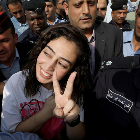Jordanian citizen Hiba Labadi gestures upon her release by Israel, at the King Hussein Bridge crossing near Amman, Jordan, November 6, 2019. REUTERS/Muhammad Hamed - RC2N5D9H4IBL